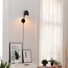 imageGLOBE Electric 51374 Cleo 1Light Plugin or Hardwire Wall Sconce Matte Antique Brass Accents Black Cloth Cord 1444Matte Black  Eastmont